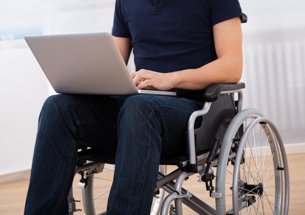 Wheelchair user using online tools